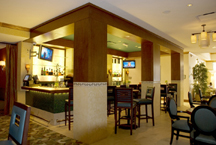 Hotel lounge features Bonier's craftsmanship in column custom woodwork, molding, and column paneling rejuvenation.